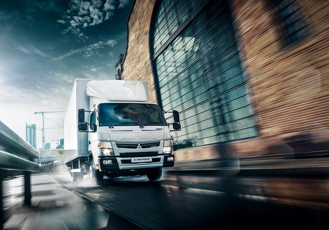 https___dxto1r4ggimee.cloudfront.net_uploads_new-vehicles_fullWidth_desktop_FUSO-Canter-eStar